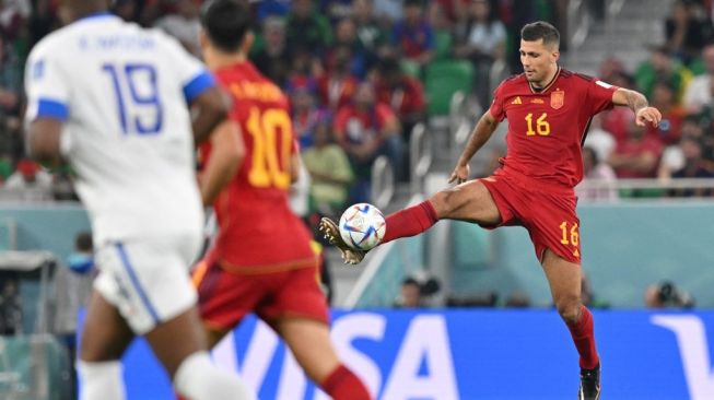 Gelandang Timnas Spanyol, Rodri. [Glyn KIRK / AFP]