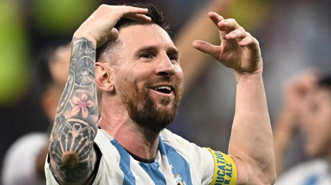 Penyerang Timnas Argentina, Lionel Messi tampil di Piala Dunia 2022. [MANAN VATSYAYANA / AFP]