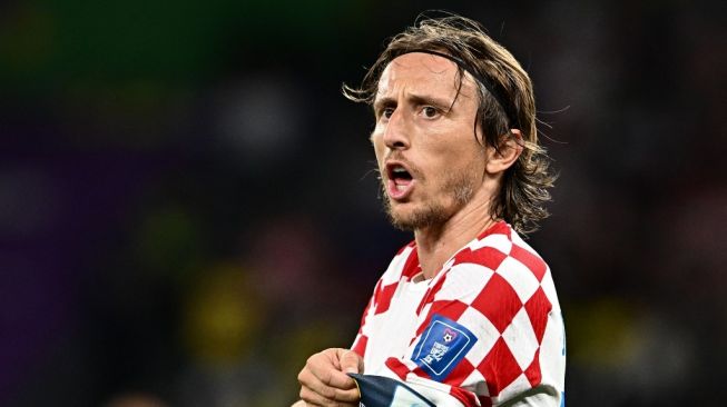 Gelandang Timnas Kroasia, Luka Modric tampil di Piala Dunia 2022. [GABRIEL BOUYS / AFP]