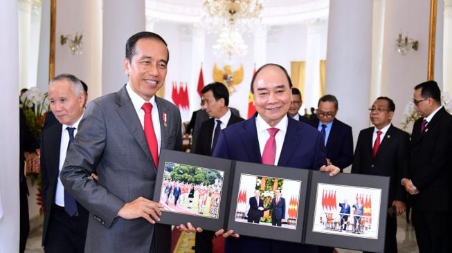 Presiden Joko Widodo atau Jokowi bersama Presiden Republik Sosialis Vietnam Nguyen Xuan Phuc di Istana Kepresidenan Bogor, Kamis (22/12/2022). [Foto: Lukas - Biro Pers Sekretariat Presiden]