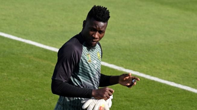 Andre Onana mengikuti sesi latihan Timnas Kamerun di Sailiya, Doha, Qatar, pada 27 November 2022. [AFP]