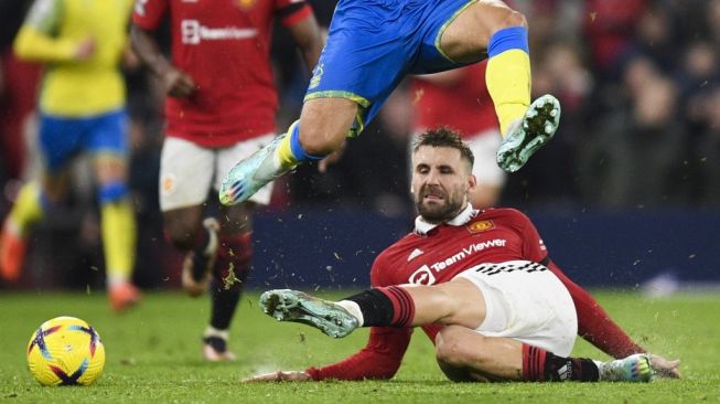 Pemain Manchester United, Luke Shaw. [OLI SCARFF / AFP]