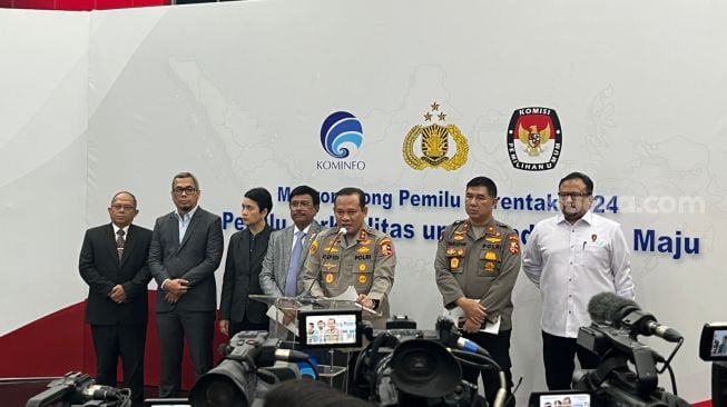 Kementerian Kominfo bekerja sama dengan Polri untuk mencegah hoaks dan berita bohong yang beredar selama Pemilu 2024, Rabu (4/1/2023). [Suara.com/Dicky Prastya]