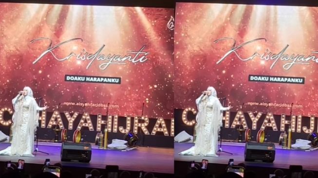 Potret Krisdayanti Berhijab saat Manggung (Instagram/@_ummi_pipik_)