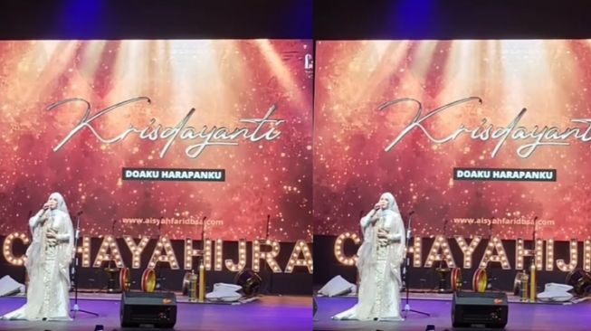 Potret Krisdayanti Berhijab saat Manggung (Instagram/@_ummi_pipik_)