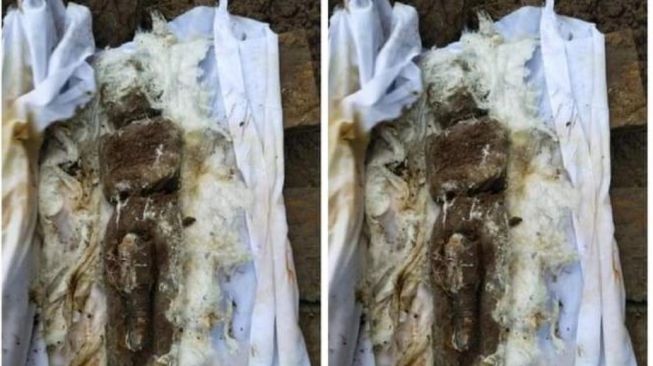 Heboh Pasutri Kubur 'Pocong' Diduga Buat Ritual Perdukunan, Isi Kain Kafannya Bikin Merinding!