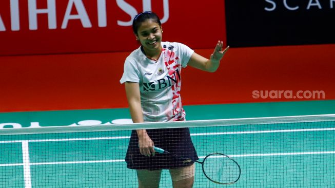 Pebulu tangkis tunggal putri Indonesia Gregoria Mariska Tunjung saat bertanding melawan tunggal putri China He Bing Jiao dalam babak 16 besar Daihatsu Indonesia Masters 2023 di Istora Senayan, Jakarta Pusat, Kamis (26/1/2023). [Suara.com/Alfian Winanto]