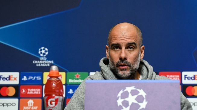 Manajer Manchester City, Pep Guardiola menghadiri konferensi pers jelang pertandingan Liga Champions kontra RB Leipzig  