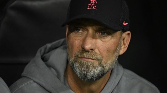 Ekspresi manajer Liverpool, Jurgen Klopp pada laga Liga Champions kontra Real Madrid di Santiago Bernabeu, Madrid, Spanyol, Kamis (16/3/2023) dini hari WIB. [JAVIER SORIANO / AFP]