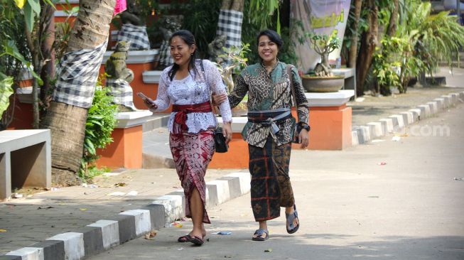 Suasana saat perayaan Hari Raya Nyepi Tahun Baru Saka 1945 di Pura Aditya Jaya, Rawamangun, Jakarta Timur, Rabu (22/3/2023). [Suara.com/Alfian Winanto]