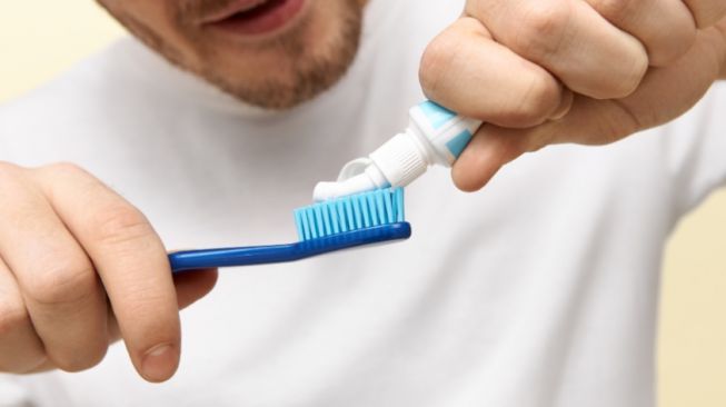 Ilustras sikat gigi - hukum sikat gigi saat puasa. (Freepik)