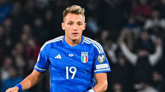 Penyerang Timnas Italia, Mateo Retegui bereaksi selama matchday pertama Grup C Kualifikasi Euro 2024 antara Italia vs Inggris, pada 23 Maret 2023 di stadion Diego-Maradona di Naples.Alberto PIZZOLI / AFP.