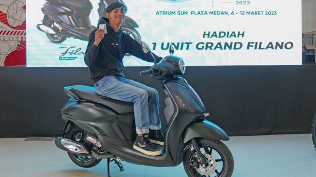 Aldi Arizki Tanjung (21), mahasiswa yang menjadi salah satu pemenang kompetisi foto Classy Yamaha Exhibition area Medan [PT YIMM].