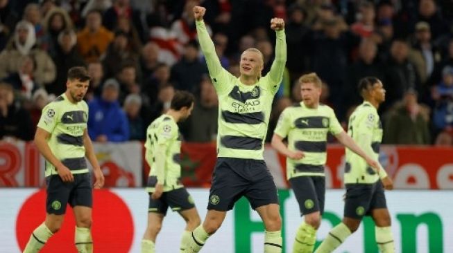 Striker Manchester City Erling Haaland merayakan golnya pada pertandingan sepak bola leg kedua perempat final Liga Champions UEFA antara Bayern Munich dan Manchester City di Munich, Jerman selatan pada 19 April 2023. Odd ANDERSEN / AFP