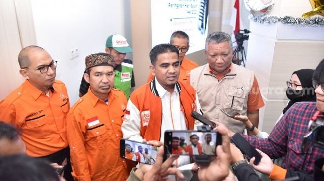 Wakil Ketua Bidang Ketenagakerjaan DPP PKS Indra (tengah). (Suara.com/Bagaskara)