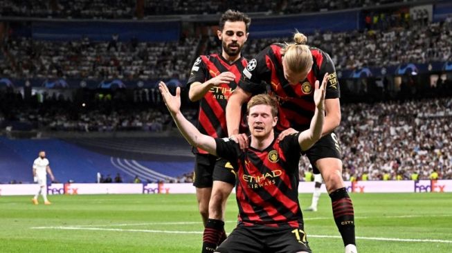 Kevin De Bruyne merayakan gol penyeimbang untuk Manchester City yang dicetaknya ke gawang Real Madrid dalam pertandingan leg pertama semifinal Liga Champions di Santiago Bernabeu pada 10 Mei 2023. ANTARA/AFP/JAVIER SORIANO