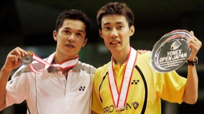 Taufik Hidayat dan Lee Chong Wei. [AFP/Toshifumi Kitamura]