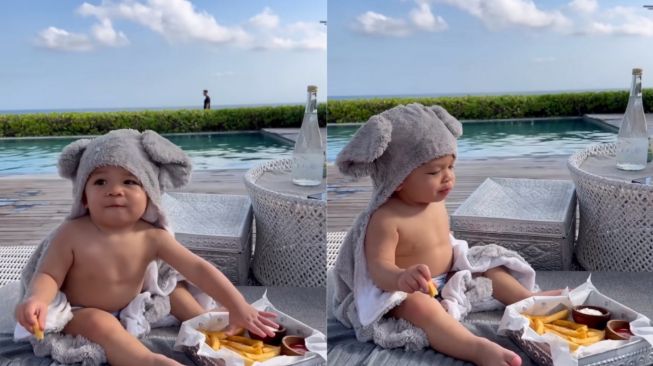 Gaya Baby Issa Nyantai di Pinggir Kolam Renang Sambil Makan Kentang Bikin Gemas, Warganet: Enaknya Jadi Anak Sultan