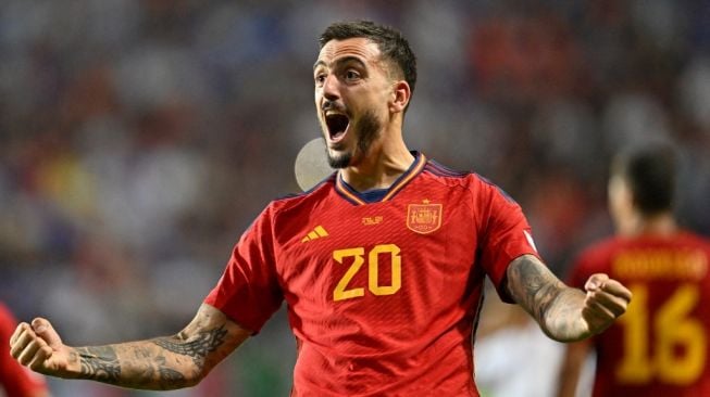 Penyerang timnas Spanyol Joselu melakukan selebrasi setelah mencetak gol kedua timnya selama pertandingan semifinal UEFA Nations League 2022-2023 antara Spanyol vs Italia di Stadion De Grolsch Veste di Enschede pada 15 Juni 2023.JOHN THYS / AFP.