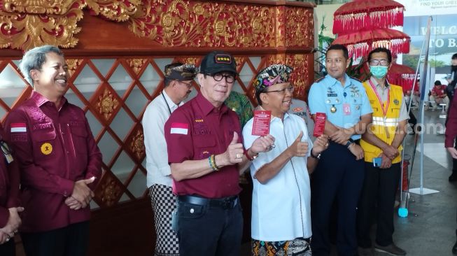 Gubernur Bali Klaim Pencabutan VoA Sudah Disetujui Menkumham, Yasonna: Kalau Dicabut Berdampak ke Daerah Lain