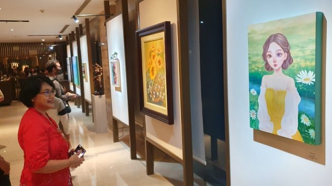 Suasana pembukaan pameran seni rupa IBUDAYA yang digelar di Grand Ambarrukmo Hotel, Jumat (7/7/2023). [Hiskia Andika Weadcaksana/Suarajogja.id]