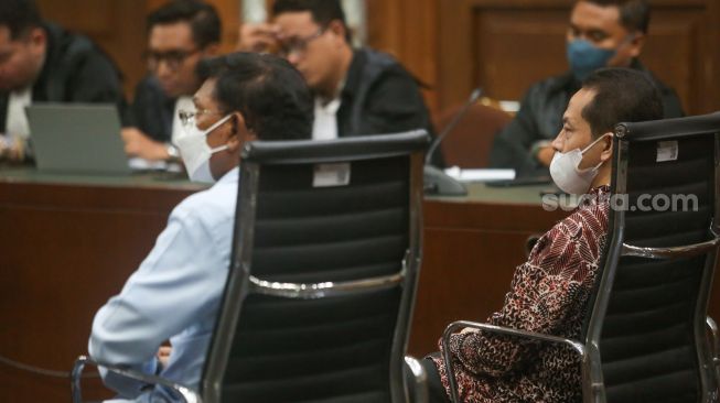 Mantan Menteri Komunikasi dan Informatika Johnny G. Plate saat mengikuti sidang lanjutan kasus dugaan korupsi penyediaan infrastruktur base transceiver station (BTS) 4G dari BAKTI Kementerian Komunikasi dan Informatika (Kemenkominfo) tahun 2020 sampai 2022 di Pengadilan Tipikor, Jakarta, Selasa (11/7/2023). [Suara.com/Alfian Winanto]