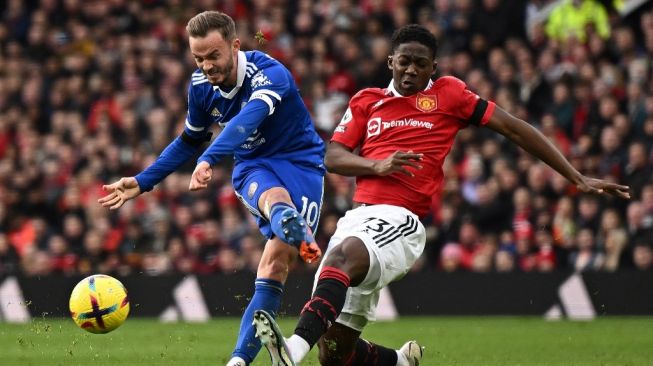 Gelandang belia Manchester United, Kobbie Mainoo (kanan). [OLI SCARFF / AFP]