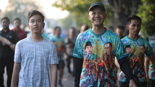 Governor of Central Java Ganjar Pranowo and Mayor of Solo Gibran Rakabuming Raka together in Solo City. 