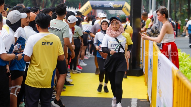 Peserta saat mengikuti gelaran Hukumonline Run 2023 di kawasan SCBD, Jakarta, Minggu (6/8/2023). [Suara.com/Alfian Winanto]