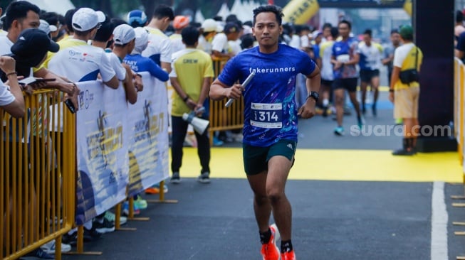 Peserta saat mengikuti gelaran Hukumonline Run 2023 di kawasan SCBD, Jakarta, Minggu (6/8/2023). [Suara.com/Alfian Winanto]