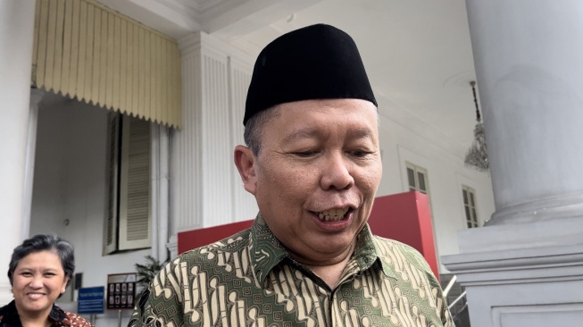 Wakil Ketua Umum PPP Arsul Sani di Kompleks Istana Kepresidenan Jakarta, Rabu (9/8/2023). (Suara.com/Ria)