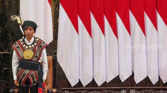 Presiden Joko Widodo saat menghadiri Sidang Tahunan DPR MPR dan Pidato Kenegaraan di Gedung Nusantara, Kompleks Parlemen, Senayan, Jakarta, Rabu (16/8/2023). [Suara.com/Alfian Winanto/Pool via Dokumentasi Parlemen]