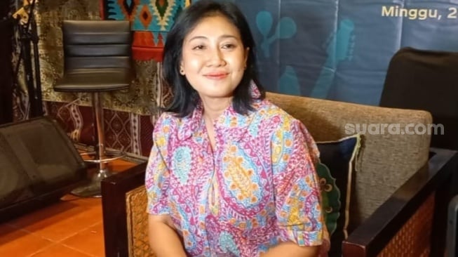 Erie Suzan di kawasan Cikini, Jakarta Pusat, Minggu (20/8/2023). [Suara.com/ Tiara Rosana]