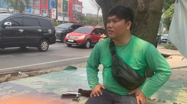 Alex, driver ojek di Palembang Sumatera Selatan