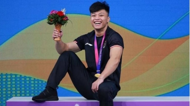 Profil Rahmat Erwin Abdullah, Lifter Asal Makassar yang Pecahkan Rekor Dunia dan Raih Emas Asian Games 2022