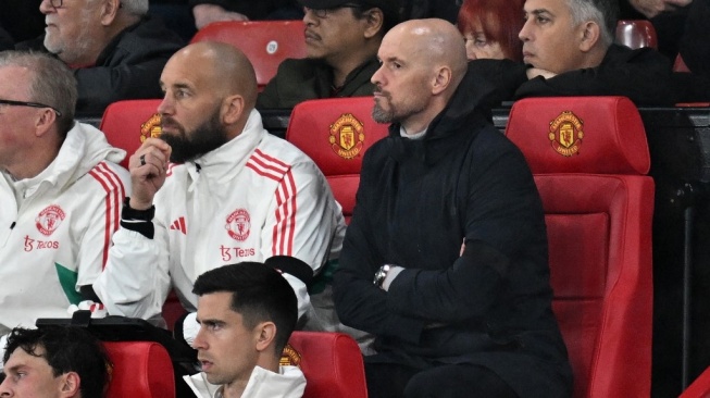 Manajer Manchester United, Erik ten Hag (kanan). [Paul ELLIS / AFP]