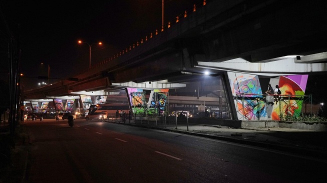 Mural hiasi dinding flyover Amplas Medan. [dok Pemkot Medan]