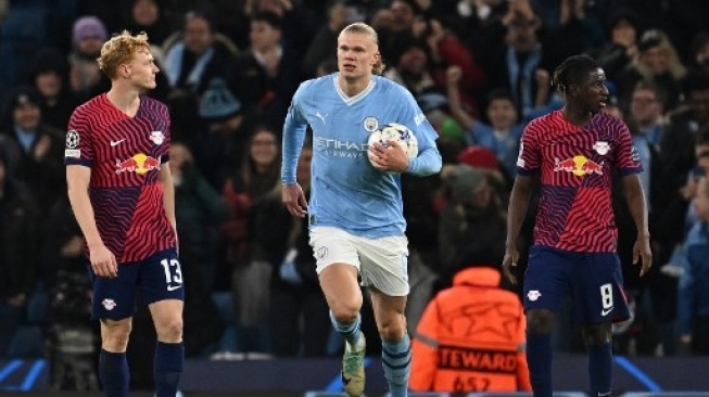 Striker Manchester City #09 Erling Haaland merayakan golnya pada pertandingan sepak bola Grup G Liga Champions UEFA antara Manchester City dan RG Leipzig di Stadion Etihad, di Manchester, barat laut Inggris, pada 28 November 2023. Paul ELLIS / AFP