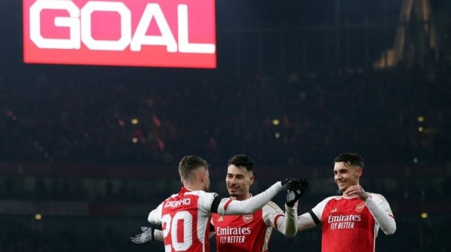 Gelandang Arsenal Jorginho merayakan gol keenam timnya pada pertandingan Grup B Liga Champions melawan Lens, yang dimainkan di Stadion Emirates, London, Rabu (29/11/2023). (ANTARA/AFP/ADRIAN DENNIS)