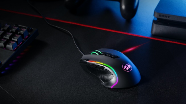 Ilustrasi gaming mouse. [Unsplash/Rebekah Yip]