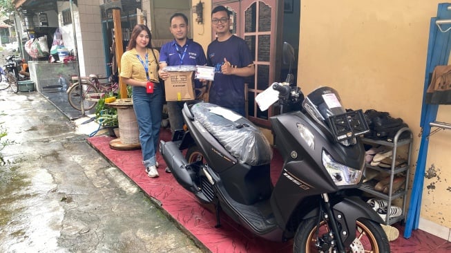 Wahyu Setiawan, salah satu pemilik Yamaha LEXi LX 155 [PT Yamaha Indonesia Motor Manufacturing].