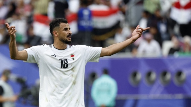Reaksi penyerang Irak, Aymen Hussein selama pertandingan babak 16 besar Piala Asia 2023 antara Irak vs Yordania di Stadion Internasional Khalifa di Doha pada 29 Januari 2024.KARIM JAAFAR / AFP.