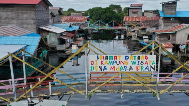 Keindahan Danau Siran di Muara Kaman, Pengunjung Bisa Susuri Hutan Gambut