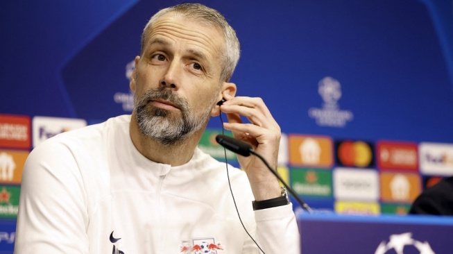 Pelatih RB Leipzig, Marco Rose menghadiri konferensi pers jelang laga Liga Champions kontra Real Madrid di Stadion Red Bull Arena, Leipzig, Jerman. [Odd ANDERSEN / AFP]