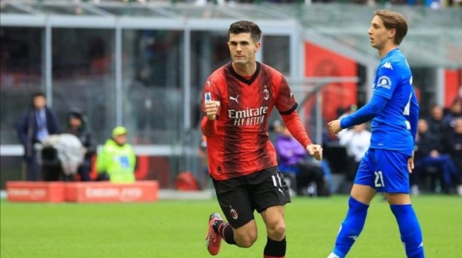 Selebrasi Christian Pulisic setelah mencetak gol untuk AC Milan ke gawang Empoli dalam pertandingan liga Italia 2023/24 pekan ke-28 di San Siro pada Minggu (10/3/2024). ANTARA/HO-AC Milan