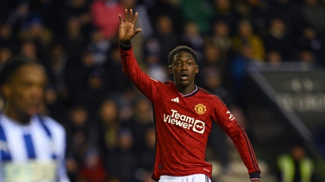 Gelandang Manchester United, Kobbie Mainoo. [PAUL ELLIS / AFP]