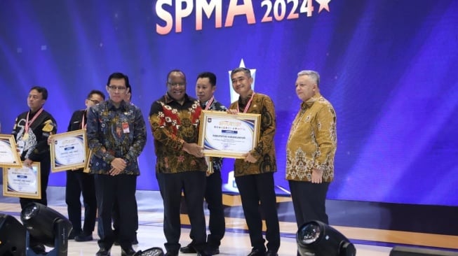 Buka SPM Awards 2024, Wamendagri Dorong Pemda Berikan Pelayanan Optimal bagi Masyarakat