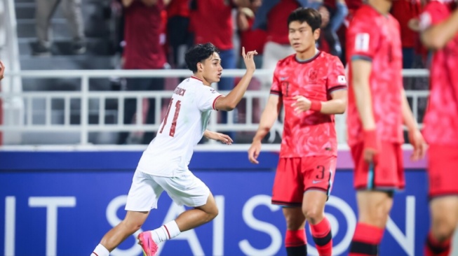 Rafael Struick berselebrasi setelah mencetak gol ke gawang Korea Selatan di Piala Asia U-23 (the-afc.com)