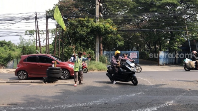 Juru Parkir di Bekasi Raup Rp200 Ribu per Hari: 4 Kali Umroh hingga Ditipu Travel