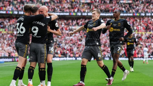 Southampton resmi kembali ke Premier League setelah mengalahkan Leeds United 1-0 dalam laga final playoff Divisi Championship 2023-2024 di Stadion Wembley, London, Senin (27/5/2024) dini hari WIB. [Dok. AFP]